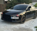 Чорний Міцубісі Lancer, об'ємом двигуна 2 л та пробігом 230 тис. км за 7499 $, фото 4 на Automoto.ua