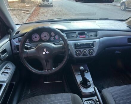 Міцубісі Lancer 2008 у Кривому Розі на Automoto.ua Чорний Міцубісі Lancer, об'ємом двигуна 1.6 л та пробігом 230 тис. км за 4380 $, фото 6 на Automoto.ua