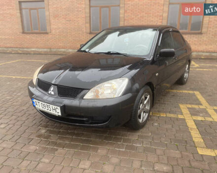 Черный Мицубиси Лансер, объемом двигателя 1.58 л и пробегом 211 тыс. км за 6333 $, фото 16 на Automoto.ua