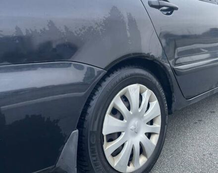 Міцубісі Lancer 2008 у Києві на Automoto.ua Чорний Міцубісі Lancer, об'ємом двигуна 1.58 л та пробігом 300 тис. км за 3800 $, фото 1 на Automoto.ua