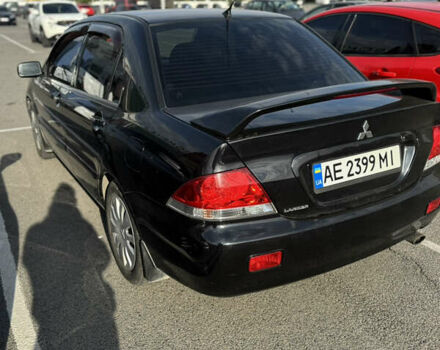 Чорний Міцубісі Lancer, об'ємом двигуна 1.58 л та пробігом 227 тис. км за 5300 $, фото 2 на Automoto.ua