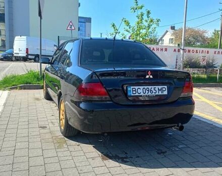 Мицубиси Лансер 2008 в Львове на Automoto.ua Черный Мицубиси Лансер, объемом двигателя 1.58 л и пробегом 200 тыс. км за 5200 $, фото 64 на Automoto.ua