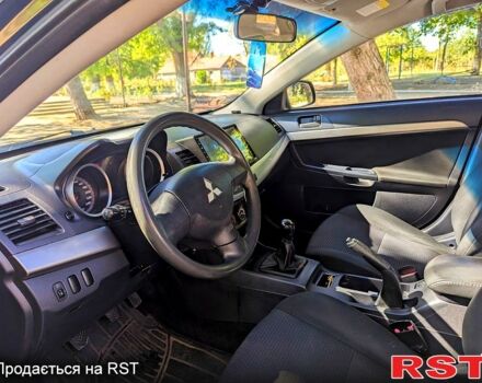 Черный Мицубиси Лансер, объемом двигателя 1.5 л и пробегом 235 тыс. км за 5250 $, фото 8 на Automoto.ua