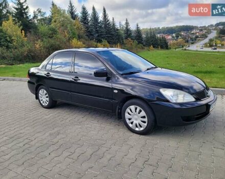 Міцубісі Lancer 2008 у Тернополі на Automoto.ua Чорний Міцубісі Lancer, об'ємом двигуна 1.58 л та пробігом 182 тис. км за 5600 $, фото 8 на Automoto.ua