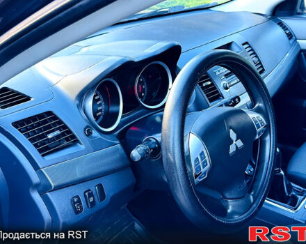 Чорний Міцубісі Lancer, об'ємом двигуна 2 л та пробігом 240 тис. км за 5900 $, фото 9 на Automoto.ua