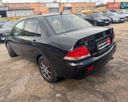 Мицубиси Лансер 2008 в Запорожье на Automoto.ua Черный Мицубиси Лансер, объемом двигателя 1.6 л и пробегом 316 тыс. км за 4290 $, фото 3 на Automoto.ua