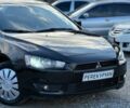 Чорний Міцубісі Lancer, об'ємом двигуна 1.5 л та пробігом 220 тис. км за 4600 $, фото 1 на Automoto.ua