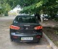 Черный Мицубиси Лансер, объемом двигателя 1.5 л и пробегом 175 тыс. км за 5800 $, фото 28 на Automoto.ua