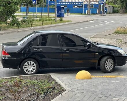 Черный Мицубиси Лансер, объемом двигателя 1.6 л и пробегом 168 тыс. км за 5662 $, фото 5 на Automoto.ua