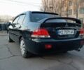 Черный Мицубиси Лансер, объемом двигателя 1.6 л и пробегом 180 тыс. км за 4699 $, фото 3 на Automoto.ua