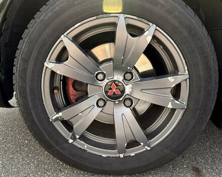 Черный Мицубиси Лансер, объемом двигателя 1.6 л и пробегом 321 тыс. км за 5000 $, фото 17 на Automoto.ua