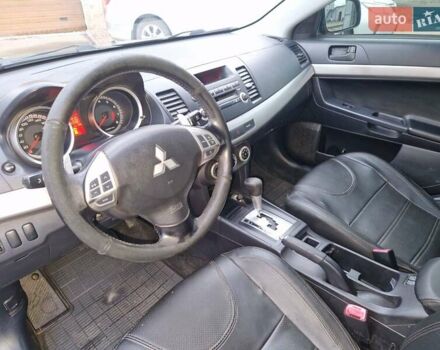 Чорний Міцубісі Lancer, об'ємом двигуна 2 л та пробігом 300 тис. км за 6000 $, фото 4 на Automoto.ua