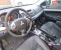 Чорний Міцубісі Lancer, об'ємом двигуна 2 л та пробігом 300 тис. км за 6000 $, фото 4 на Automoto.ua