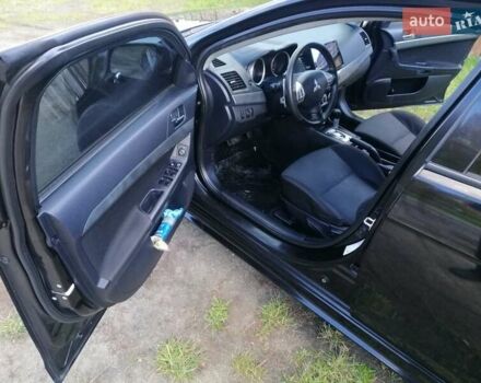 Мицубиси Лансер 2008 в Киеве на Automoto.ua Черный Мицубиси Лансер, объемом двигателя 2 л и пробегом 196 тыс. км за 5500 $, фото 18 на Automoto.ua