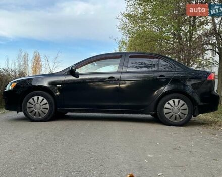 Черный Мицубиси Лансер, объемом двигателя 1.5 л и пробегом 285 тыс. км за 4800 $, фото 10 на Automoto.ua