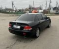Черный Мицубиси Лансер, объемом двигателя 1.6 л и пробегом 1 тыс. км за 3750 $, фото 2 на Automoto.ua