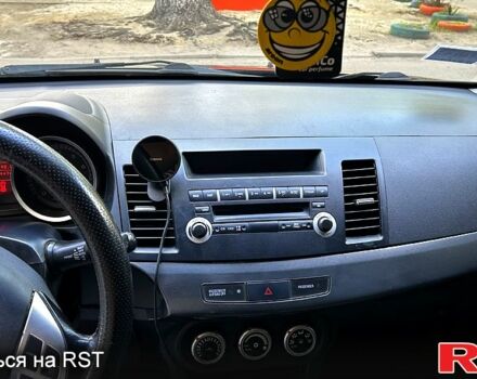 Мицубиси Лансер 2008 в Полтаве на Automoto.ua Черный Мицубиси Лансер, объемом двигателя 2 л и пробегом 284 тыс. км за 6300 $, фото 7 на Automoto.ua