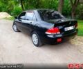 Черный Мицубиси Лансер, объемом двигателя 1.6 л и пробегом 215 тыс. км за 4500 $, фото 2 на Automoto.ua