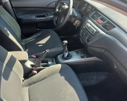 Черный Мицубиси Лансер, объемом двигателя 1.6 л и пробегом 409 тыс. км за 3000 $, фото 7 на Automoto.ua