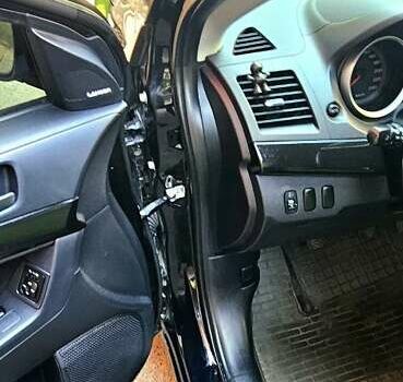 Черный Мицубиси Лансер, объемом двигателя 1.5 л и пробегом 205 тыс. км за 6300 $, фото 10 на Automoto.ua