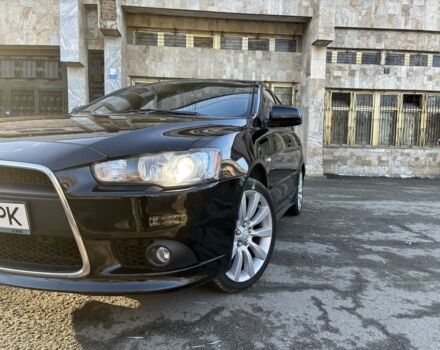 Черный Мицубиси Лансер, объемом двигателя 2 л и пробегом 236 тыс. км за 6550 $, фото 2 на Automoto.ua