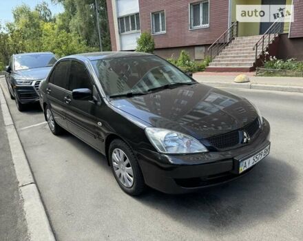 Чорний Міцубісі Lancer, об'ємом двигуна 1.6 л та пробігом 78 тис. км за 3999 $, фото 4 на Automoto.ua