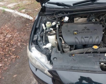 Чорний Міцубісі Lancer, об'ємом двигуна 2 л та пробігом 232 тис. км за 5000 $, фото 5 на Automoto.ua