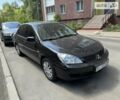 Чорний Міцубісі Lancer, об'ємом двигуна 1.6 л та пробігом 78 тис. км за 3999 $, фото 4 на Automoto.ua