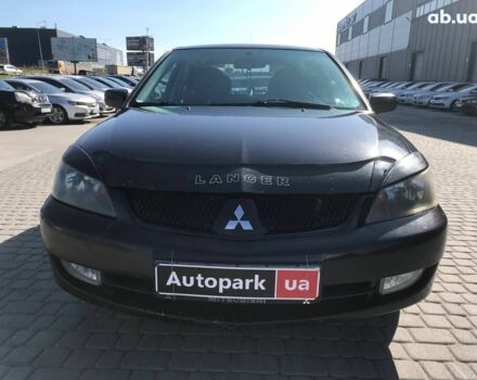 Черный Мицубиси Лансер, объемом двигателя 1.6 л и пробегом 356 тыс. км за 4590 $, фото 1 на Automoto.ua