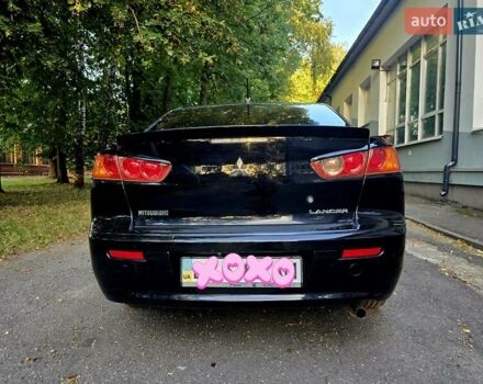 Чорний Міцубісі Lancer, об'ємом двигуна 1.5 л та пробігом 132 тис. км за 7999 $, фото 14 на Automoto.ua