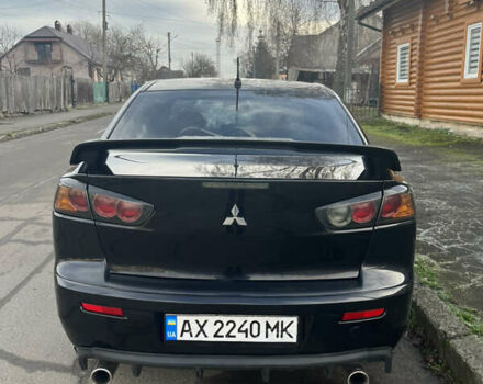 Черный Мицубиси Лансер, объемом двигателя 2 л и пробегом 270 тыс. км за 5400 $, фото 4 на Automoto.ua