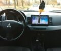 Черный Мицубиси Лансер, объемом двигателя 1.5 л и пробегом 230 тыс. км за 5300 $, фото 4 на Automoto.ua