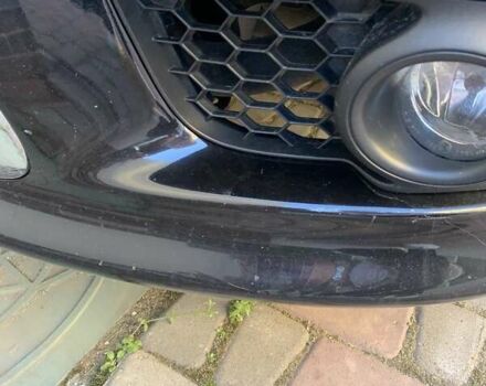 Черный Мицубиси Лансер, объемом двигателя 2 л и пробегом 210 тыс. км за 7000 $, фото 11 на Automoto.ua