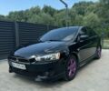 Чорний Міцубісі Lancer, об'ємом двигуна 2 л та пробігом 173 тис. км за 6900 $, фото 1 на Automoto.ua
