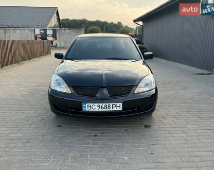 Чорний Міцубісі Lancer, об'ємом двигуна 1.58 л та пробігом 237 тис. км за 4500 $, фото 12 на Automoto.ua