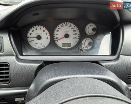 Черный Мицубиси Лансер, объемом двигателя 1.58 л и пробегом 202 тыс. км за 4100 $, фото 5 на Automoto.ua