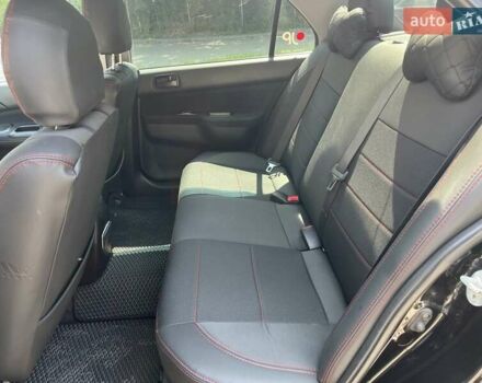 Чорний Міцубісі Lancer, об'ємом двигуна 1.6 л та пробігом 296 тис. км за 4200 $, фото 30 на Automoto.ua