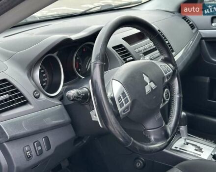 Чорний Міцубісі Lancer, об'ємом двигуна 2 л та пробігом 199 тис. км за 7900 $, фото 26 на Automoto.ua