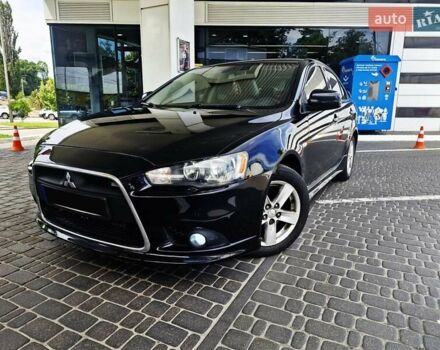 Чорний Міцубісі Lancer, об'ємом двигуна 2 л та пробігом 240 тис. км за 7850 $, фото 10 на Automoto.ua