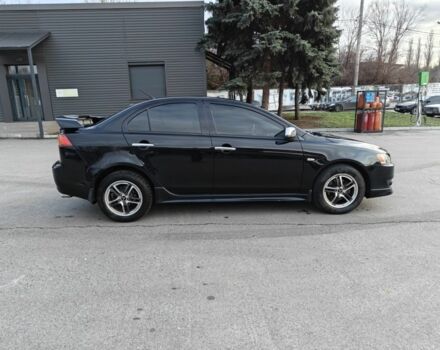 Черный Мицубиси Лансер, объемом двигателя 2 л и пробегом 245 тыс. км за 5600 $, фото 6 на Automoto.ua