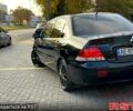 Чорний Міцубісі Lancer, об'ємом двигуна 1.6 л та пробігом 202 тис. км за 5700 $, фото 5 на Automoto.ua