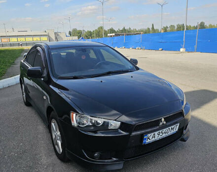 Чорний Міцубісі Lancer, об'ємом двигуна 2 л та пробігом 249 тис. км за 6500 $, фото 1 на Automoto.ua
