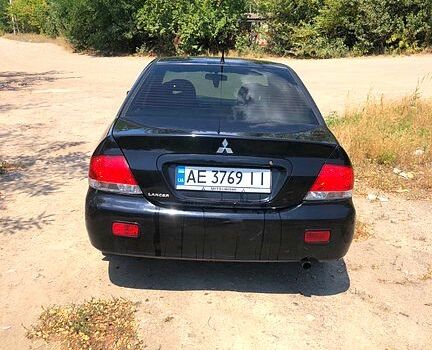 Чорний Міцубісі Lancer, об'ємом двигуна 1.6 л та пробігом 245 тис. км за 3200 $, фото 2 на Automoto.ua