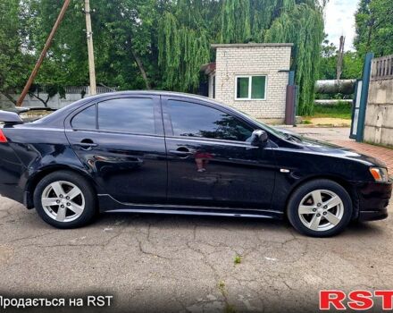 Чорний Міцубісі Lancer, об'ємом двигуна 2 л та пробігом 177 тис. км за 7000 $, фото 1 на Automoto.ua