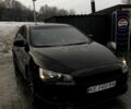 Черный Мицубиси Лансер, объемом двигателя 2 л и пробегом 116 тыс. км за 6000 $, фото 1 на Automoto.ua