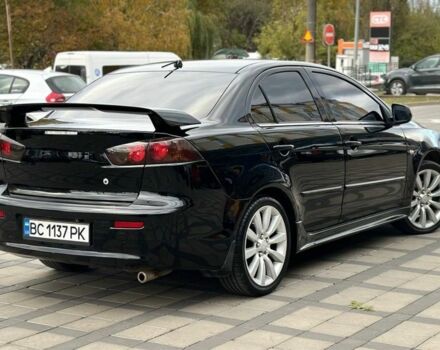 Чорний Міцубісі Lancer, об'ємом двигуна 2 л та пробігом 236 тис. км за 7900 $, фото 3 на Automoto.ua