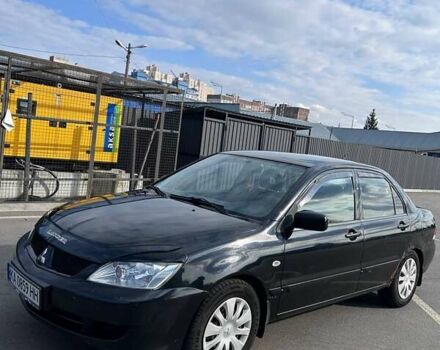 Чорний Міцубісі Lancer, об'ємом двигуна 1.6 л та пробігом 310 тис. км за 3500 $, фото 4 на Automoto.ua