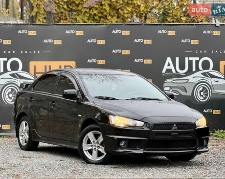 Чорний Міцубісі Lancer, об'ємом двигуна 2 л та пробігом 118 тис. км за 6200 $, фото 1 на Automoto.ua
