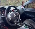 Черный Мицубиси Лансер, объемом двигателя 2 л и пробегом 213 тыс. км за 6700 $, фото 9 на Automoto.ua