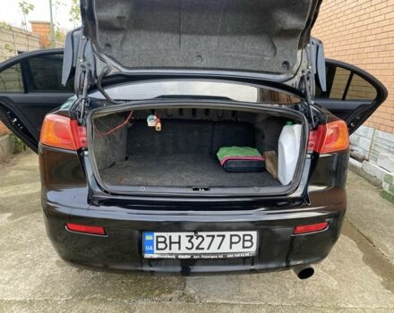 Черный Мицубиси Лансер, объемом двигателя 2 л и пробегом 140 тыс. км за 7200 $, фото 4 на Automoto.ua